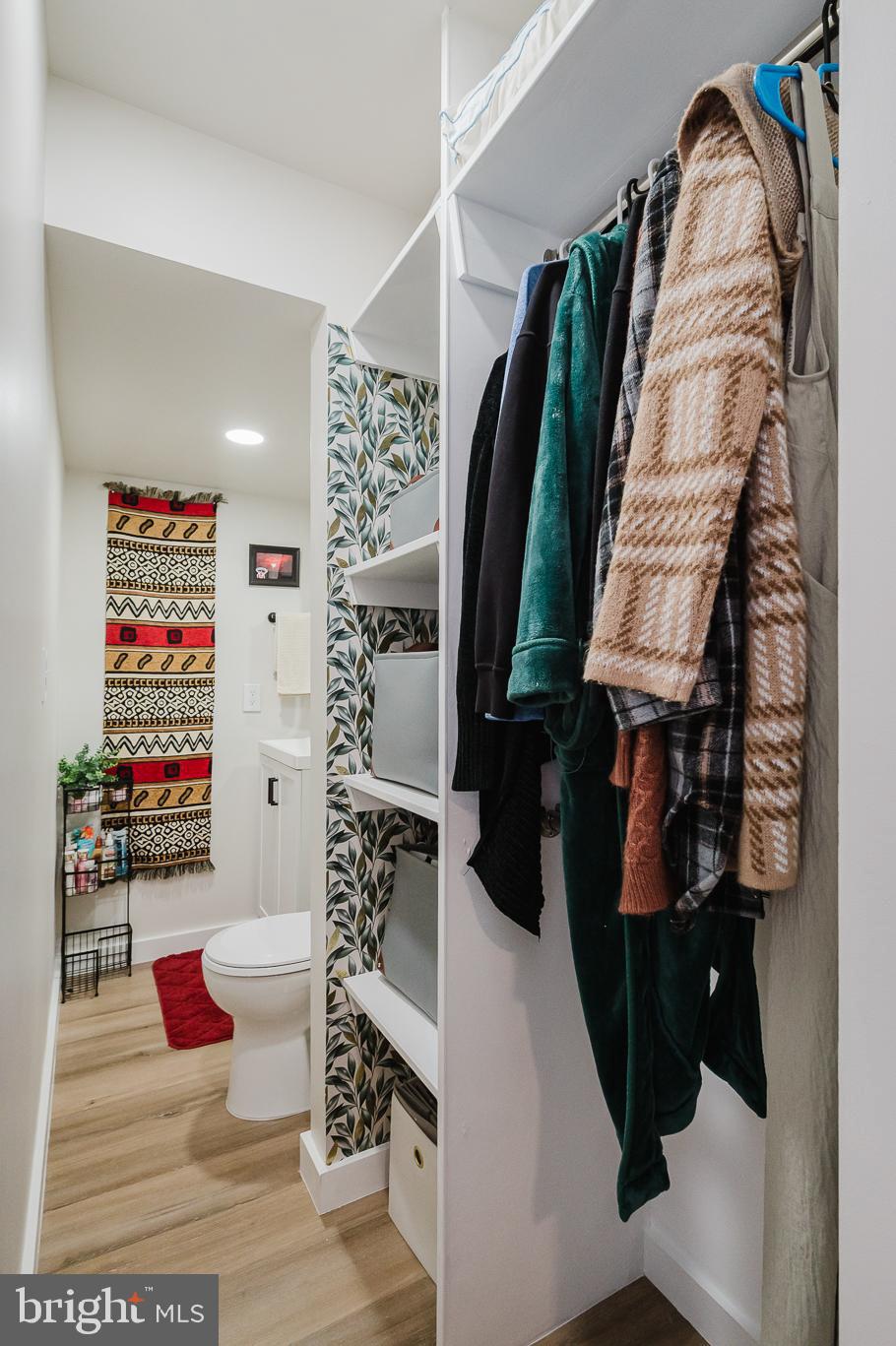 976 Pagonia Road Joppa, MD 21085 - Photo 51 of 69 a view of walk in closet with clothes and shoes