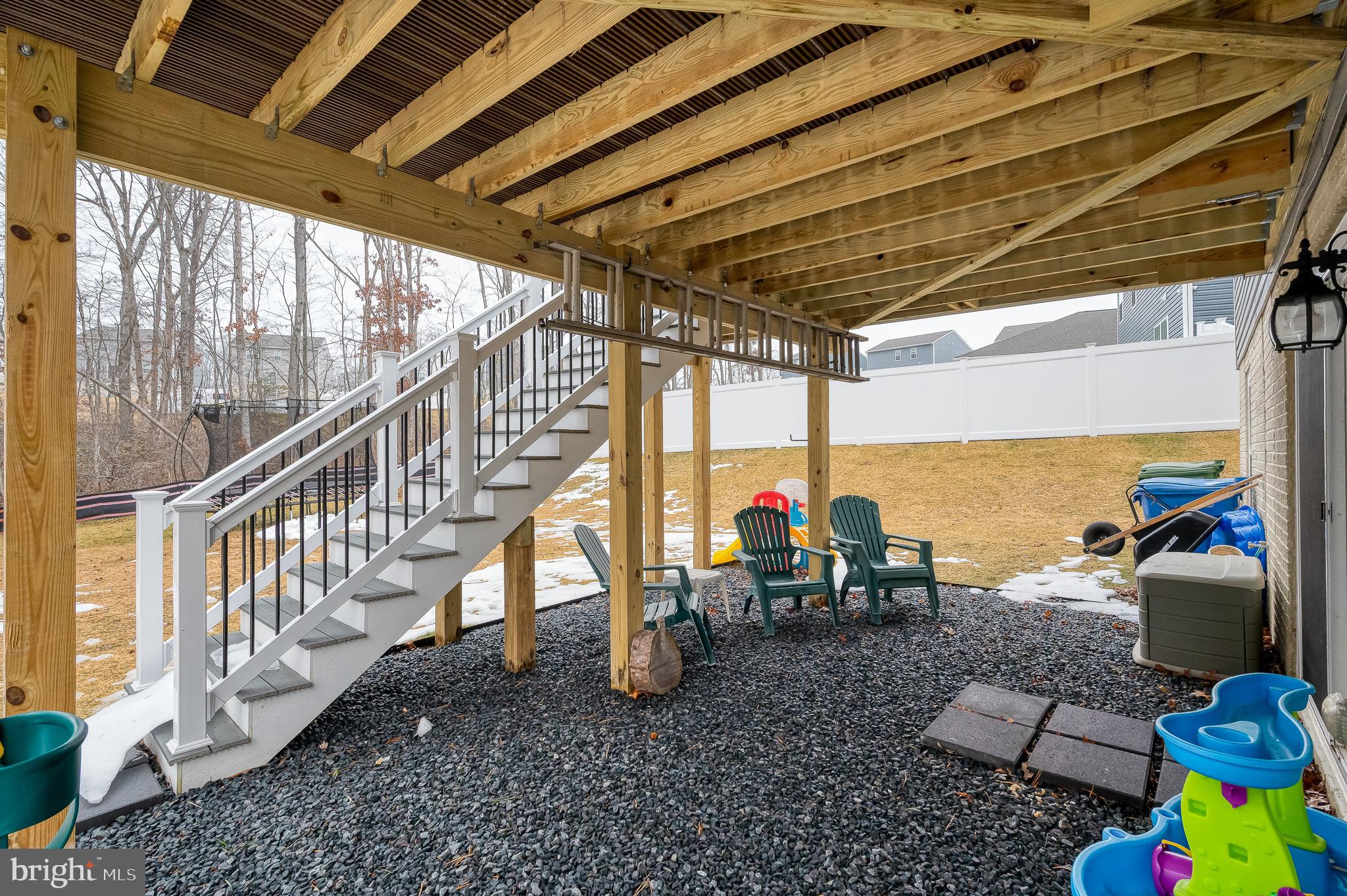 976 Pagonia Road Joppa, MD 21085 - Photo 56 of 69 a view of a swimming pool with a table and chairs in the patio