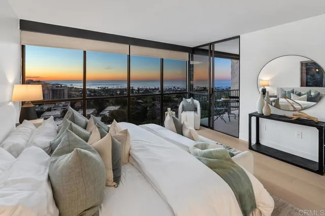 a bathroom with a double vanity sink and mirror