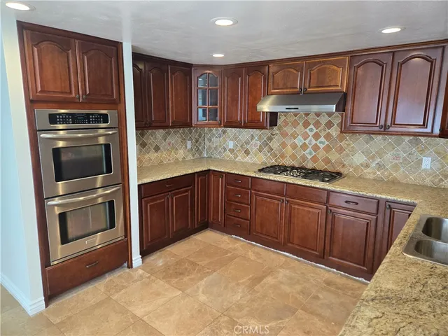 a view of a hallway with a door