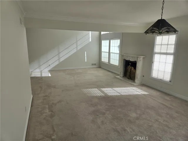 a view of hallway with a window