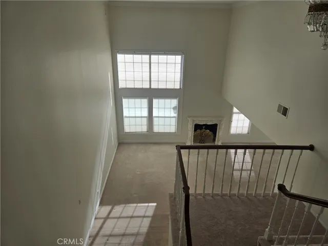 a view of hallway with stairs