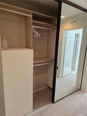 a front view of a house with outdoor seating