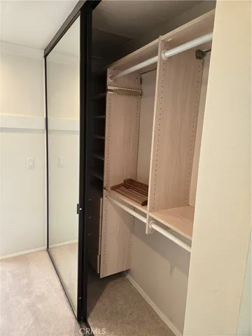 a view of a house with backyard porch and sitting area