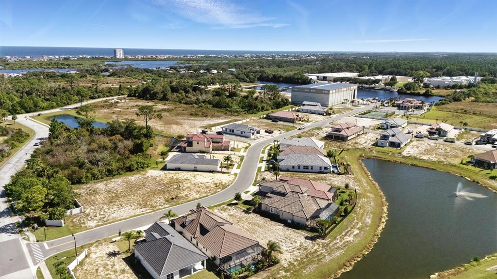 6 Rio Vista Drive Palm Coast, FL 32137 - Photo 8 of 20 an aerial view of a house with a lake view