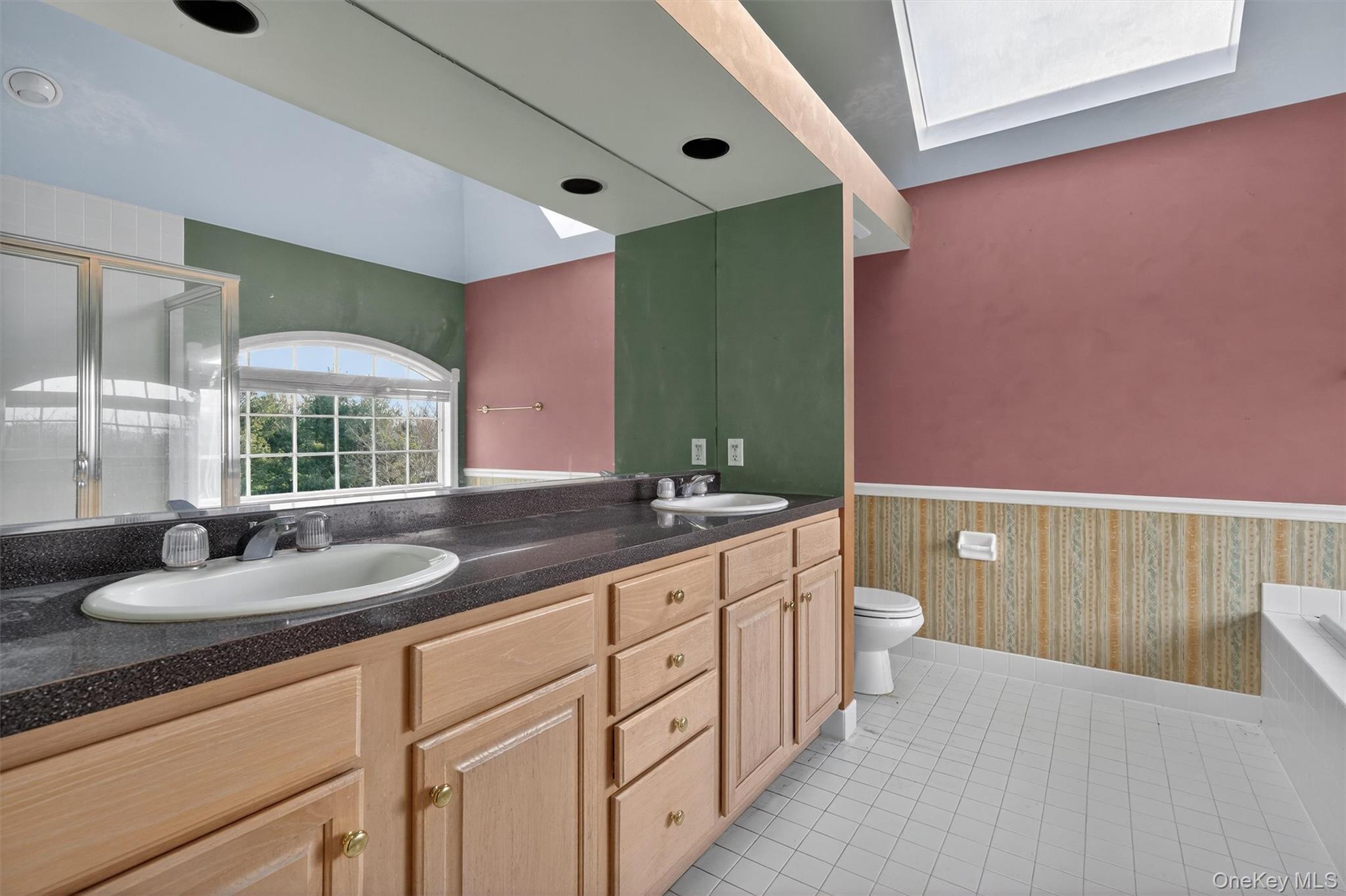 21 Jessup Road Warwick, NY 10990 - Photo 30 of 50 a bathroom with a granite countertop sink and a large mirror