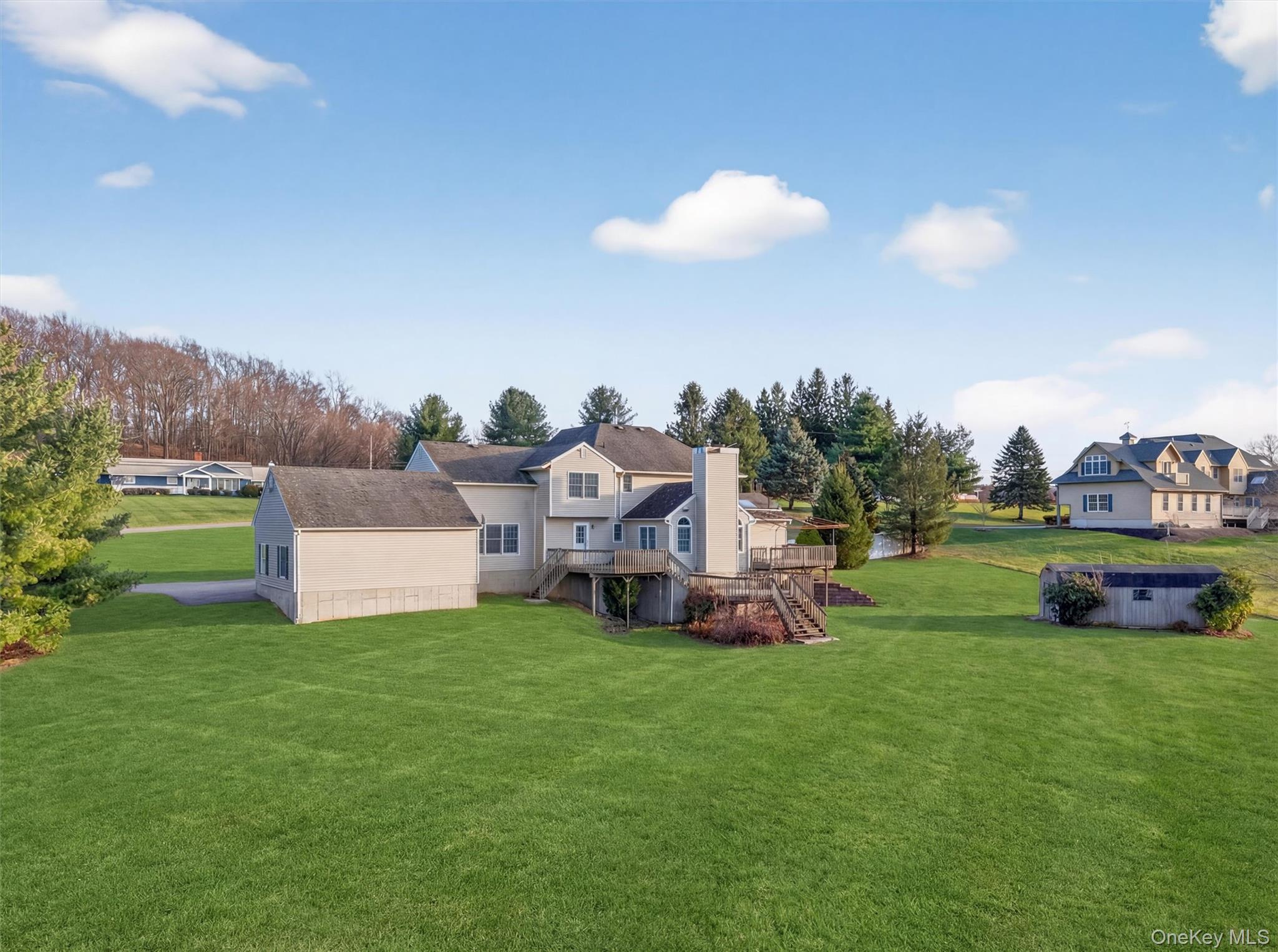 21 Jessup Road Warwick, NY 10990 - Photo 46 of 50 a view of a house with a big yard and a large trees