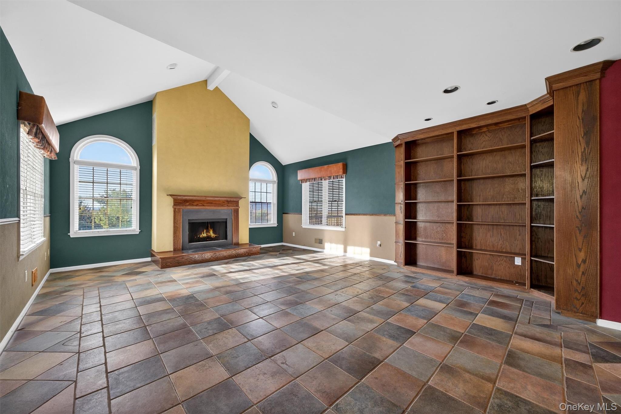 21 Jessup Road Warwick, NY 10990 - Photo 10 of 50 a view of an empty room with a fireplace and a window