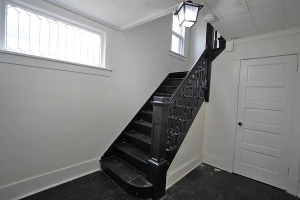 a view of entryway with wooden floor