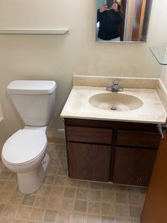 1830 Truckee Way Salinas, CA 93906 - Photo 9 of 17 a bathroom with a toilet a sink and mirror