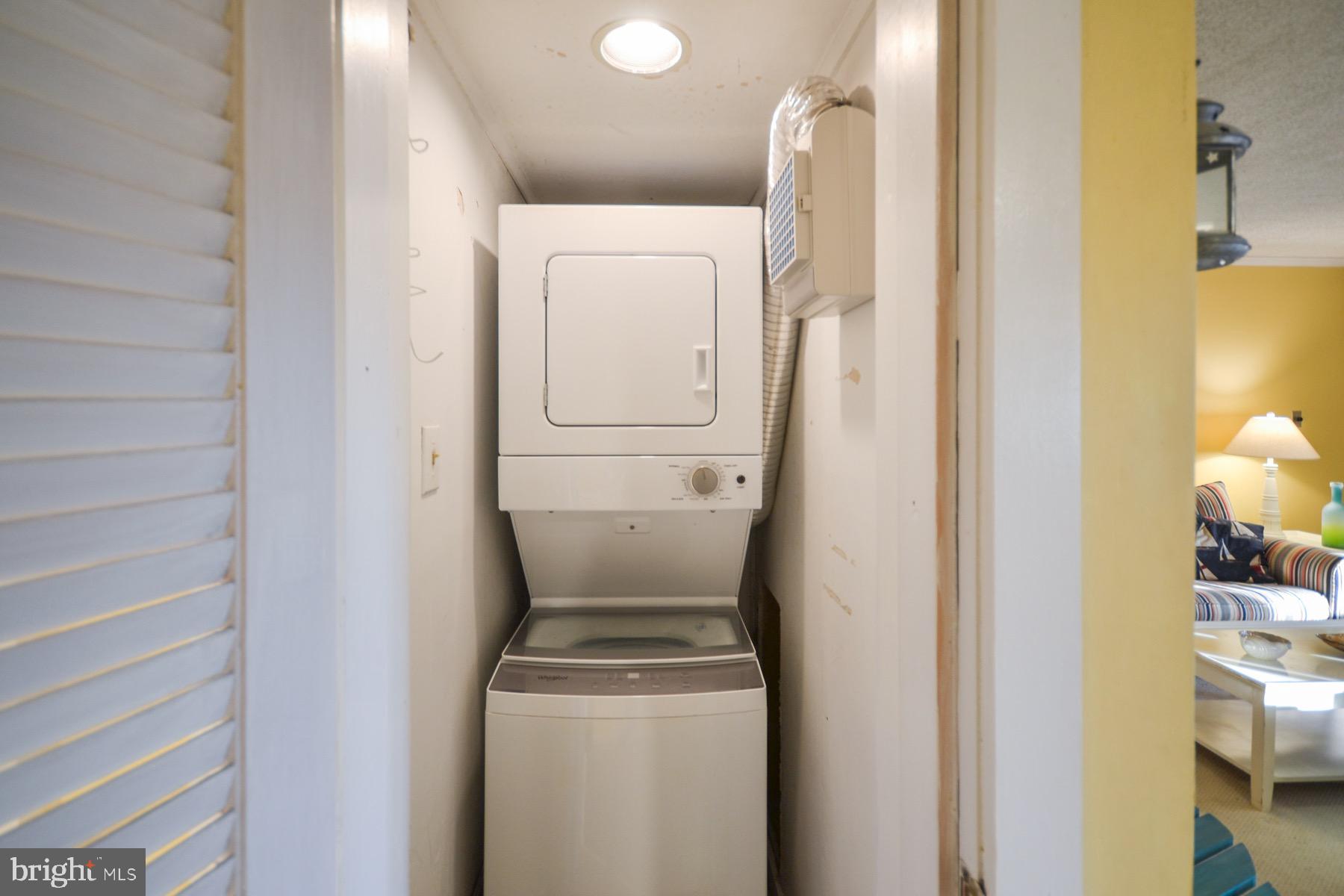 119 Old Landing Road, Unit 204J Ocean City, MD 21842 - Photo 23 of 35 a utility room with dryer and washer