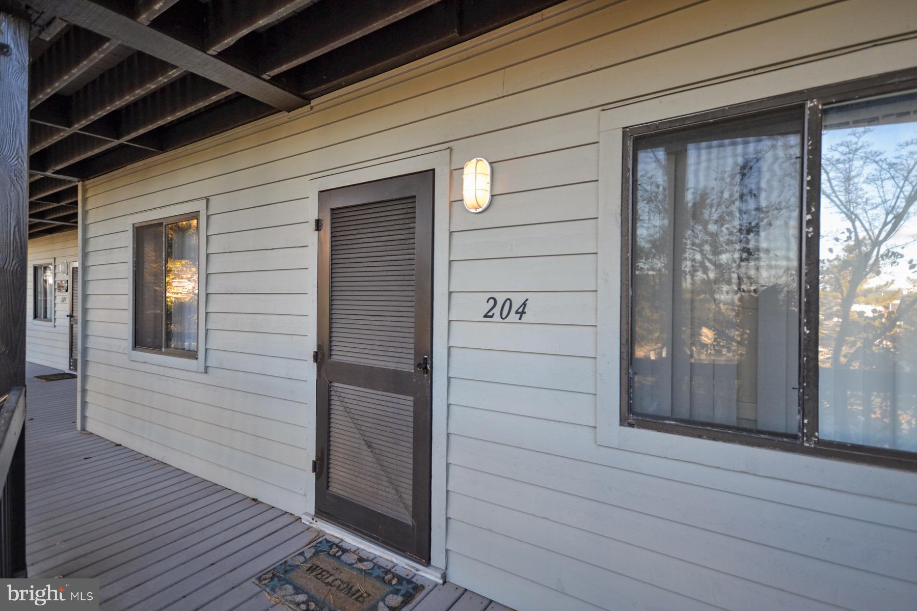 119 Old Landing Road, Unit 204J Ocean City, MD 21842 - Photo 28 of 35 a view of front door of house