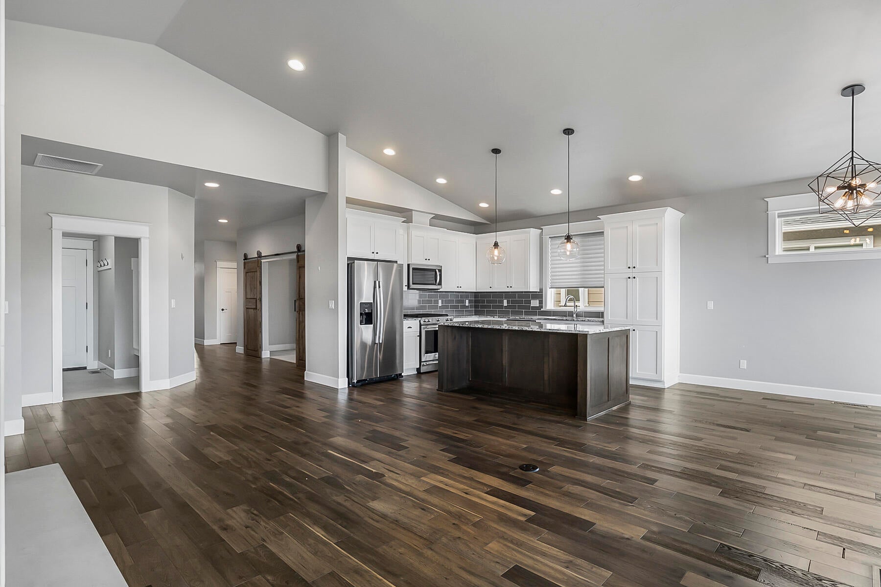 the Spacious living area with large Kitchen Island, Great Room,