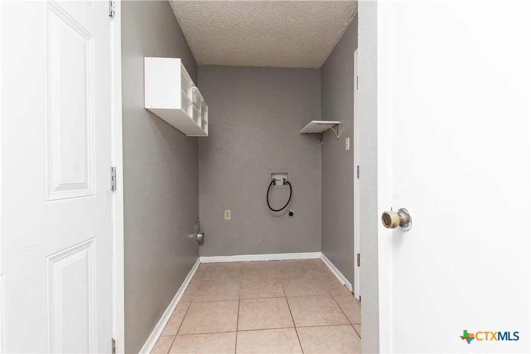 1520 McCarthy Avenue Killeen, TX 76549 - Photo 6 of 23 a bathroom with a shower