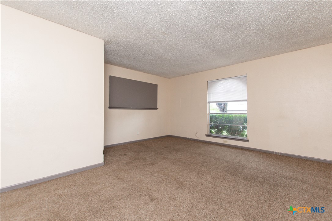 1520 McCarthy Avenue Killeen, TX 76549 - Photo 9 of 23 an empty room with windows