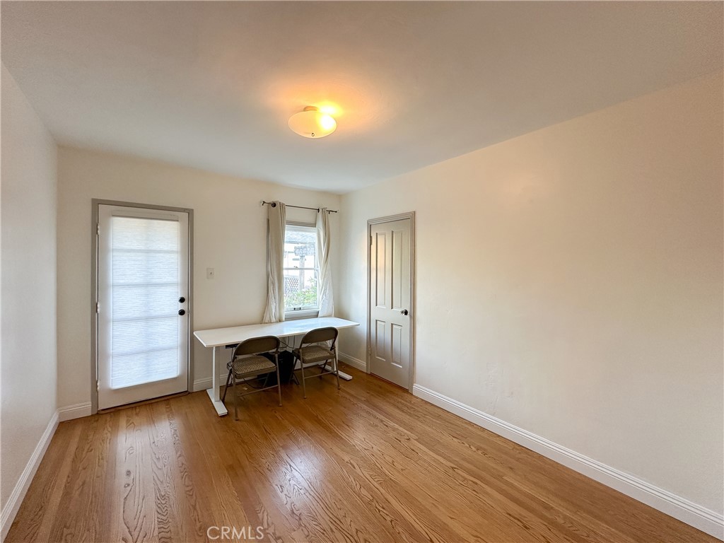 2315 North Flower Street Santa Ana, CA 92706 - Photo 14 of 20 a view of a livingroom with furniture and wooden floor