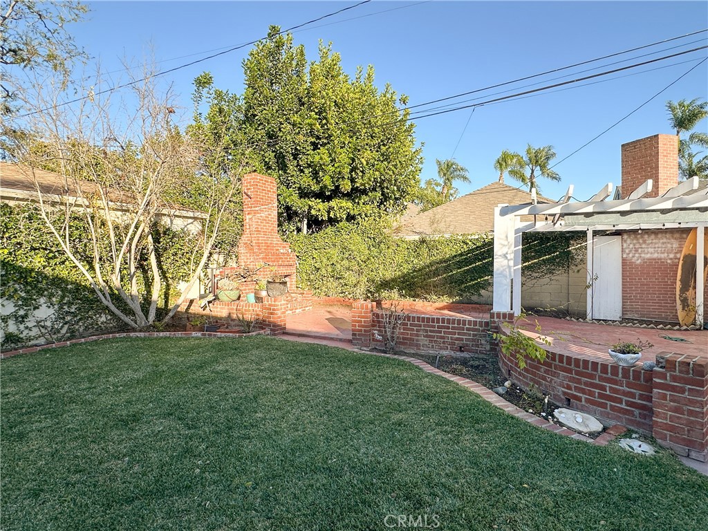 2315 North Flower Street Santa Ana, CA 92706 - Photo 19 of 20 a view of a back yard of the house
