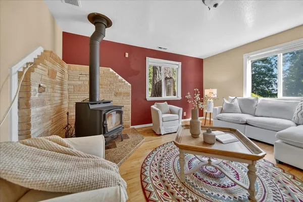 a living room with furniture and a table