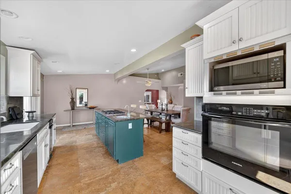 a room with furniture and wooden floor