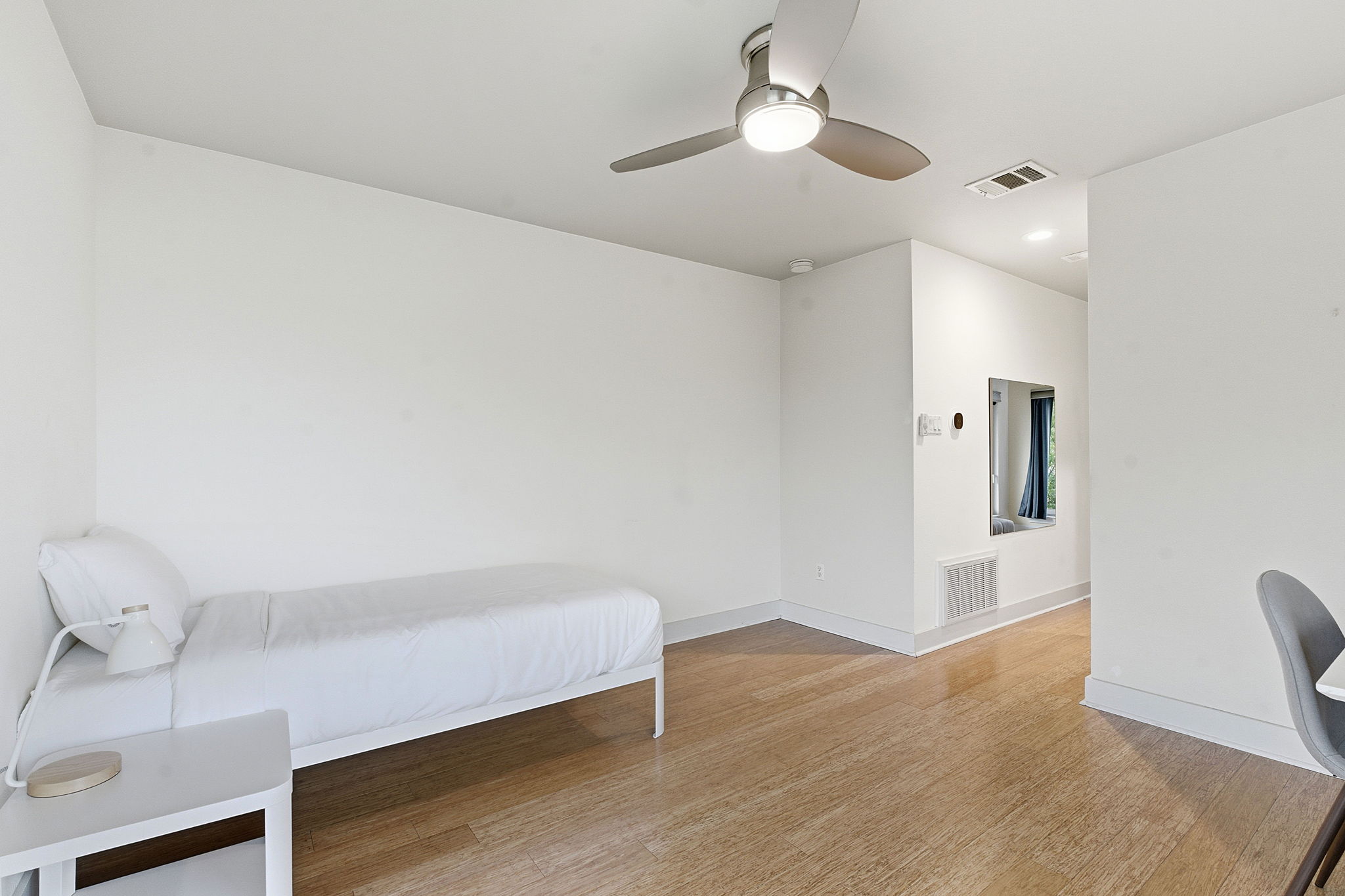 616 West Monroe Street Austin, TX 78704 - Photo 11 of 14 wooden floor in an empty room