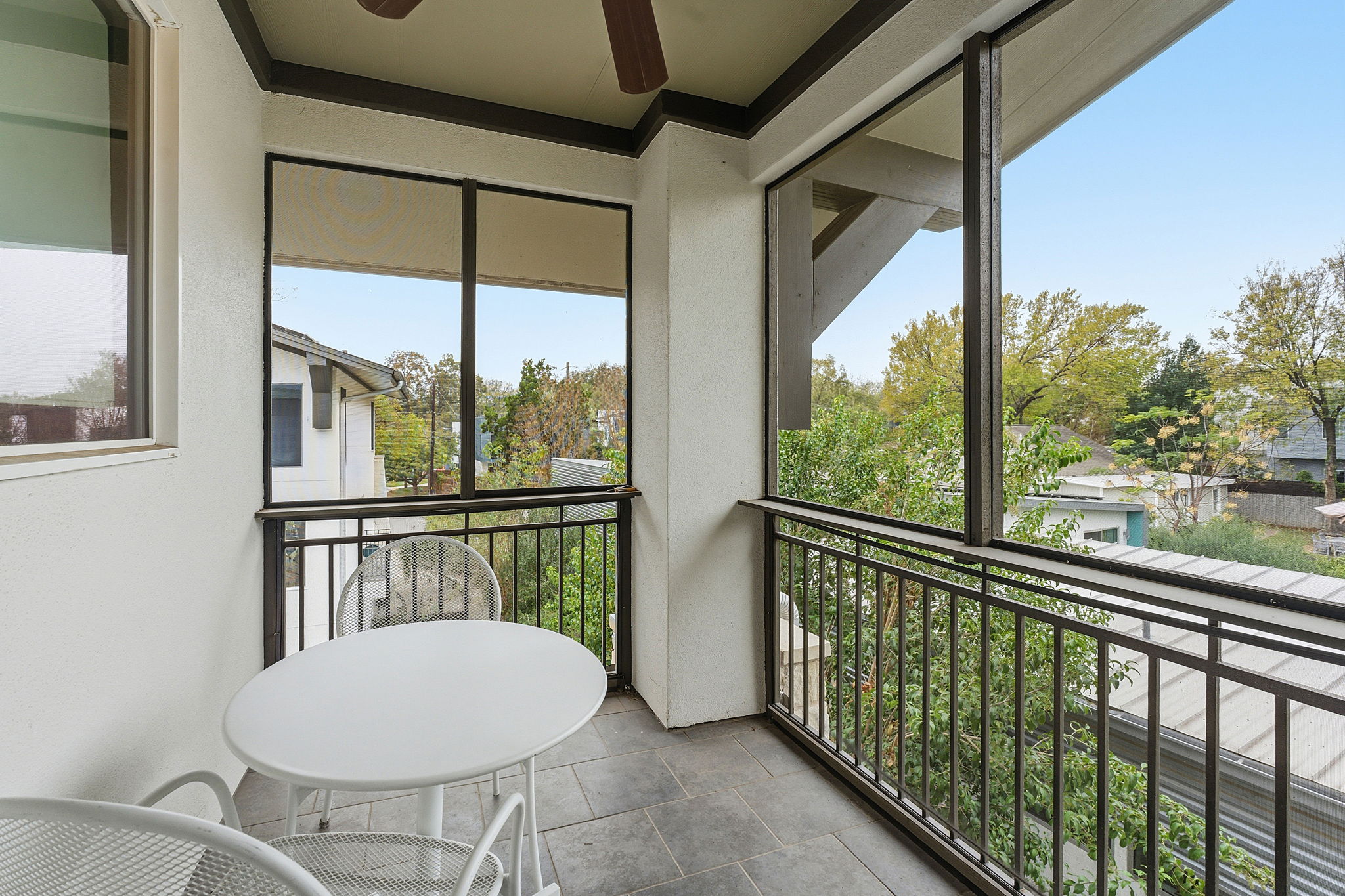 616 West Monroe Street Austin, TX 78704 - Photo 13 of 14 a view of a room with a large window and wooden floor