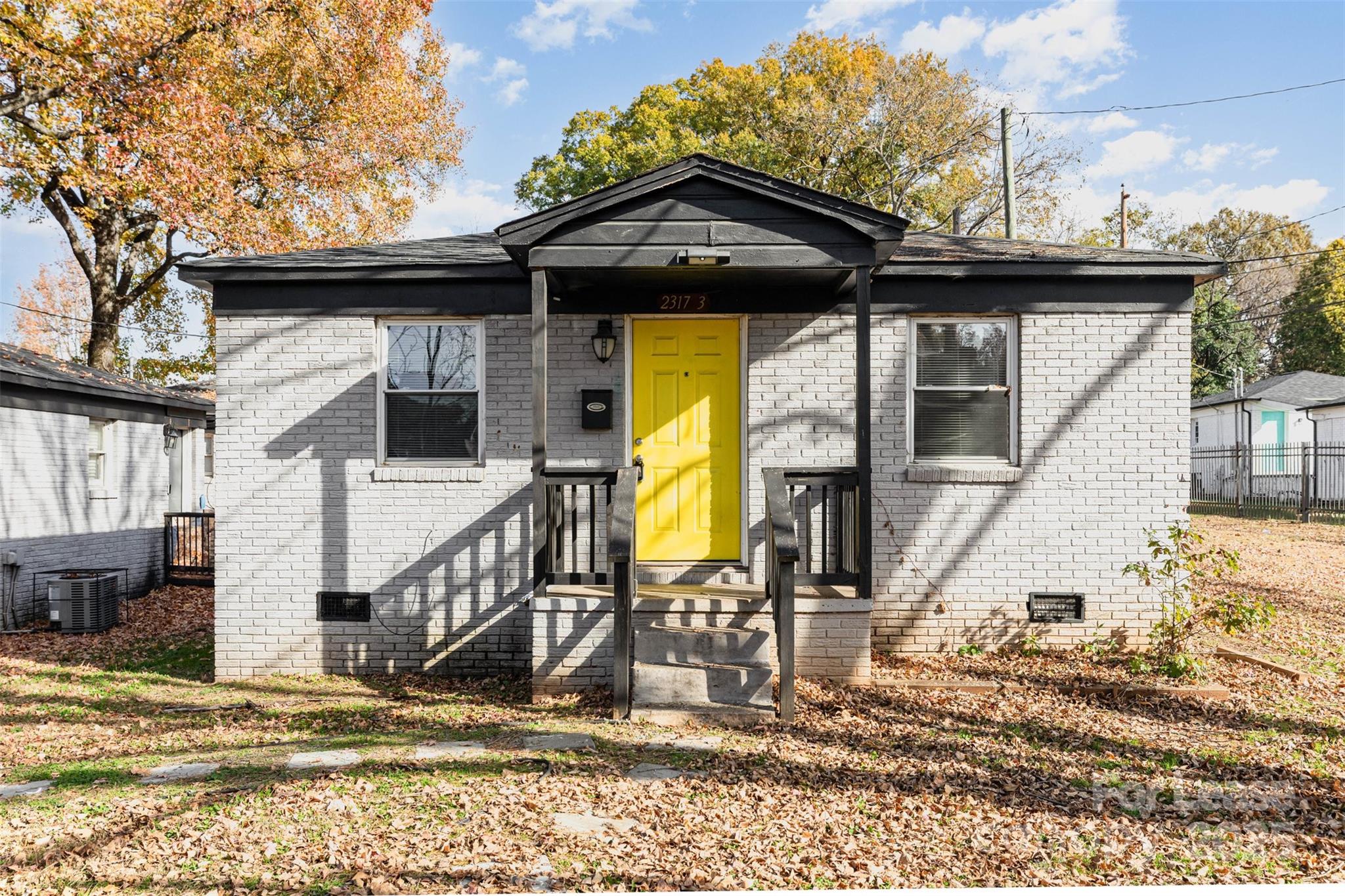 2317 Julia Avenue, Unit 3 Charlotte, NC 28206 - Photo 1 of 12 a view of a house with large windows