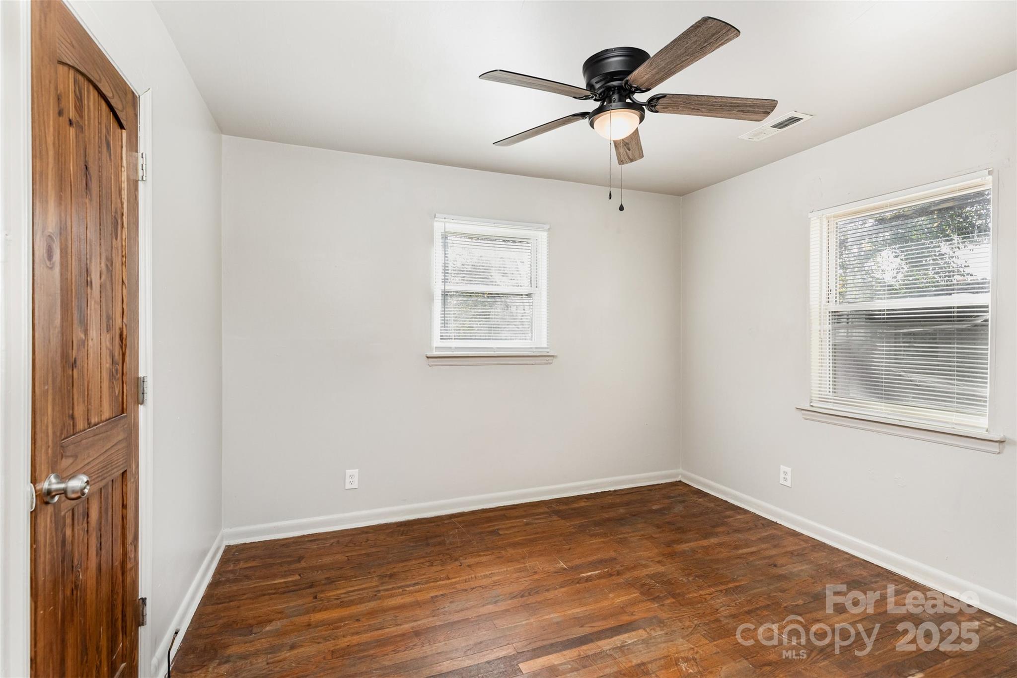 2317 Julia Avenue, Unit 3 Charlotte, NC 28206 - Photo 9 of 12 a view of room with window and ceiling fan