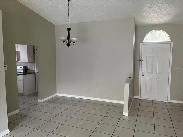 a view of a kitchen storage and utility room