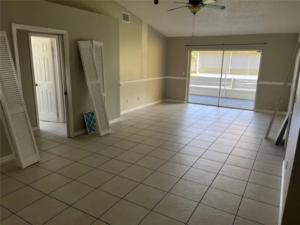 an empty room with windows