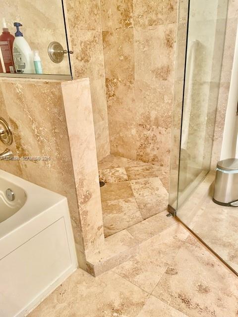 3232 Southwest 22nd Terrace, Unit 1303 Miami, FL 33145 - Photo 22 of 43 a bathroom with a sink and a shower
