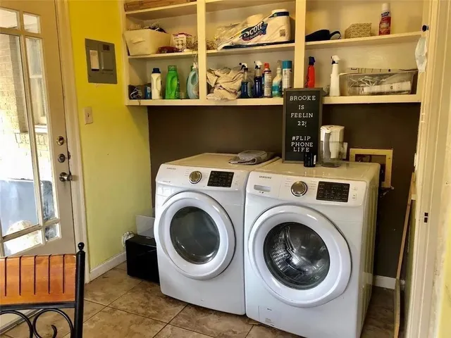 a utility room with dryer and washer