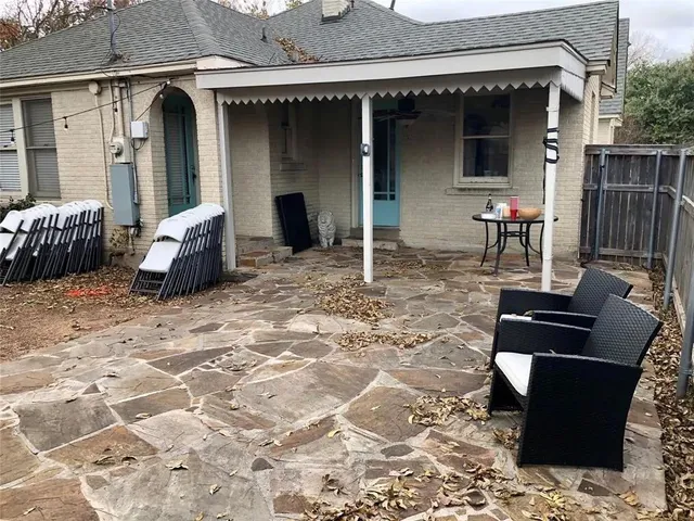 a backyard of a house with seating space