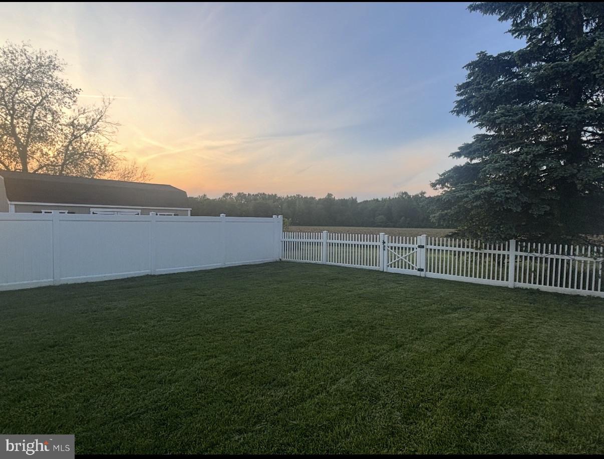 273 Crosswicks Road Bordentown, NJ 08505 - Photo 28 of 31 Tranquil sunset over a lush yard.