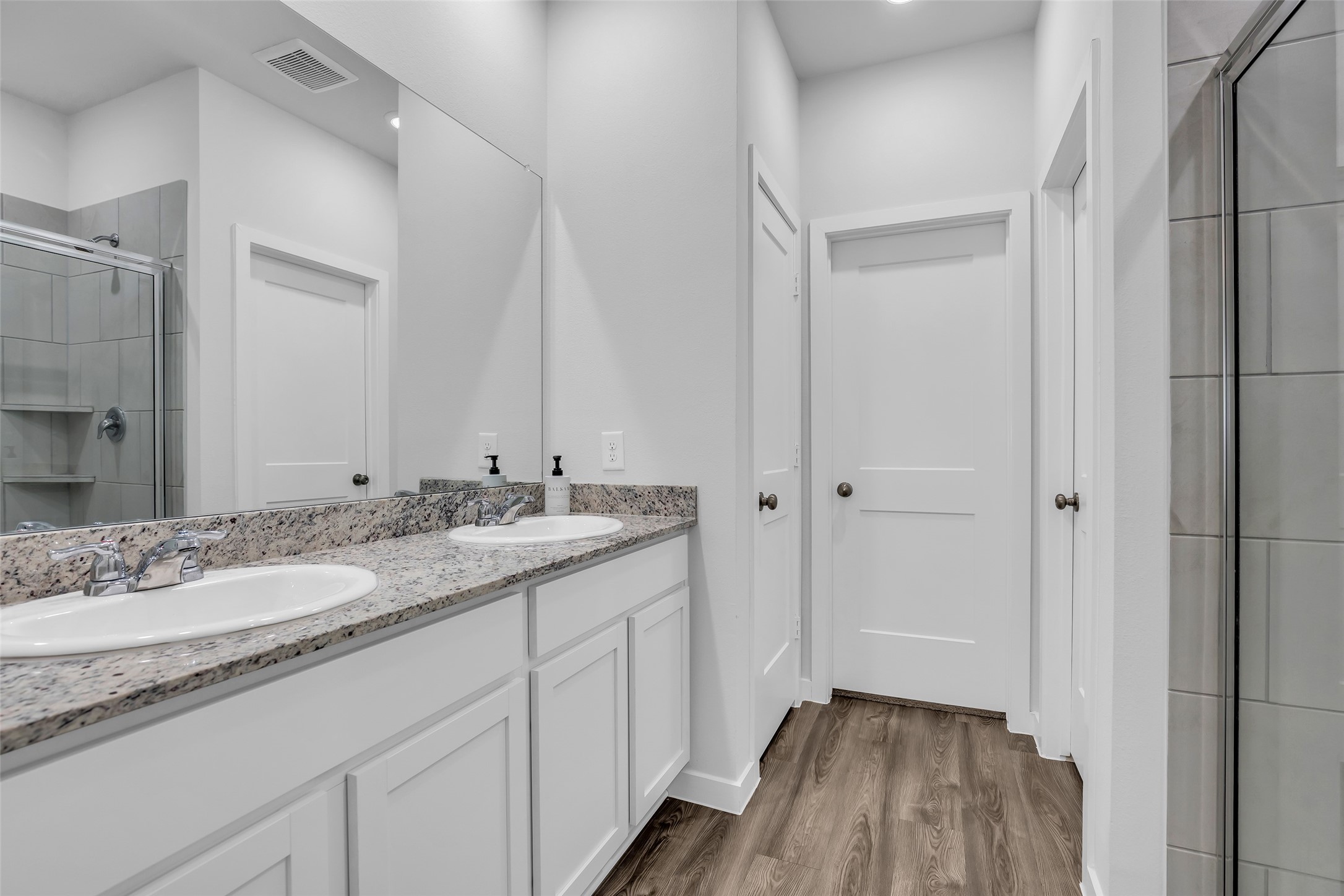 243 Intrepid Trail Magnolia, TX 77354 - Photo 8 of 17 Master Bathroom with Double sink, shower and Walking closet plus private Toilet