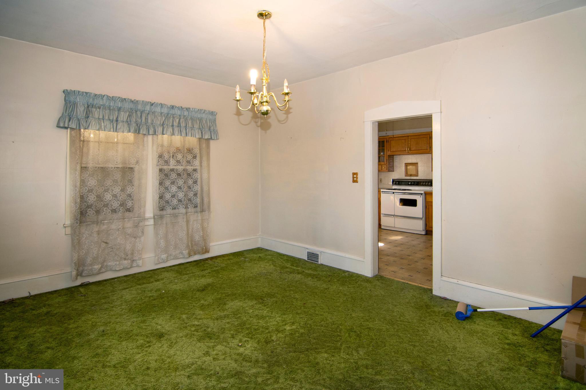542 Williamstown Road Sicklerville, NJ 08081 - Photo 11 of 38 a view of a livingroom with a chandelier a ceiling fan and entryway