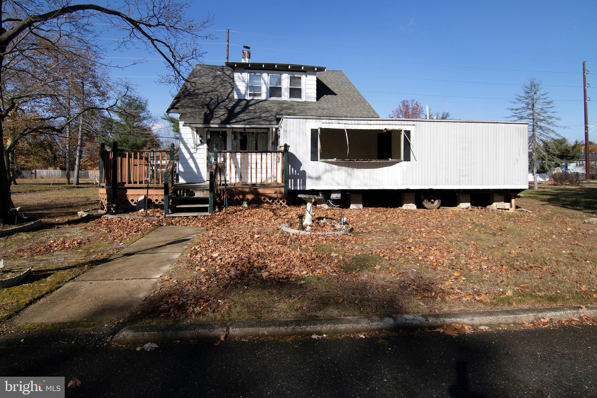 542 Williamstown Road Sicklerville, NJ 08081 - Photo 32 of 38 a front view of a house with a yard