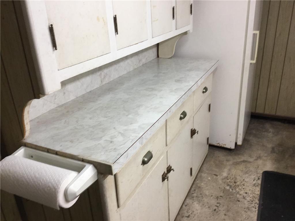 1105 Main Street Slatington, PA 18080 - Photo 23 of 31 Functional cabinetry provides storage and a practical counter surface within this utility space.