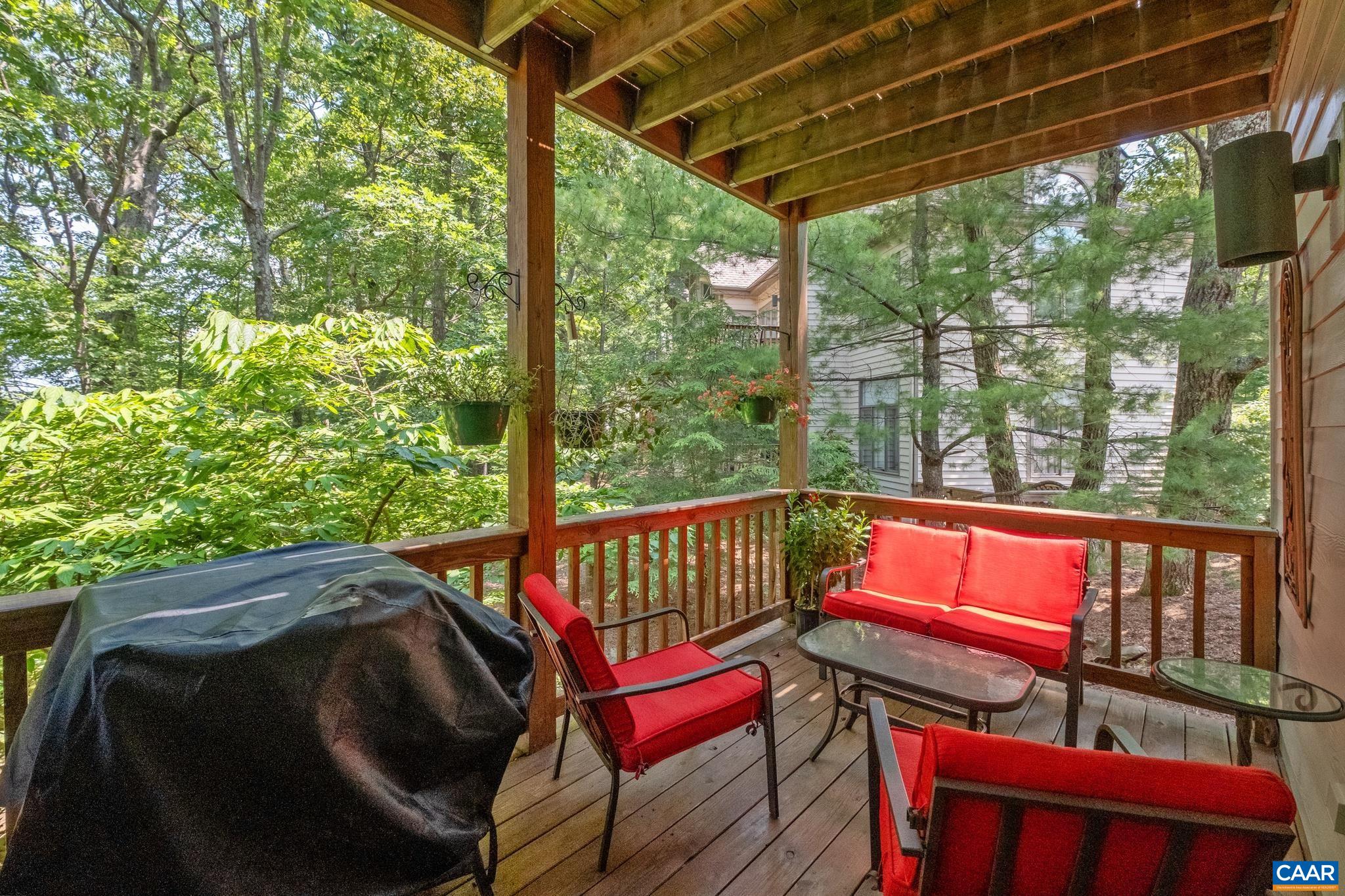 2003 Stone Rdg Wds Roseland, VA 22967 - Photo 17 of 29 a view of a two chairs in the deck