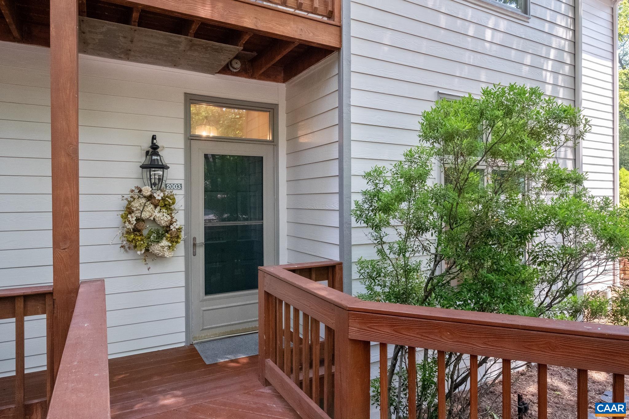 2003 Stone Rdg Wds Roseland, VA 22967 - Photo 18 of 29 a view of a balcony with potted plants