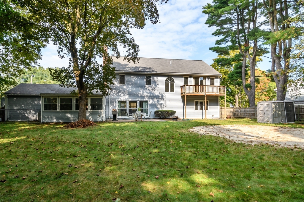 9 Liberty Street Natick, MA 01760 - Photo 26 of 27 a front view of a house with a garden