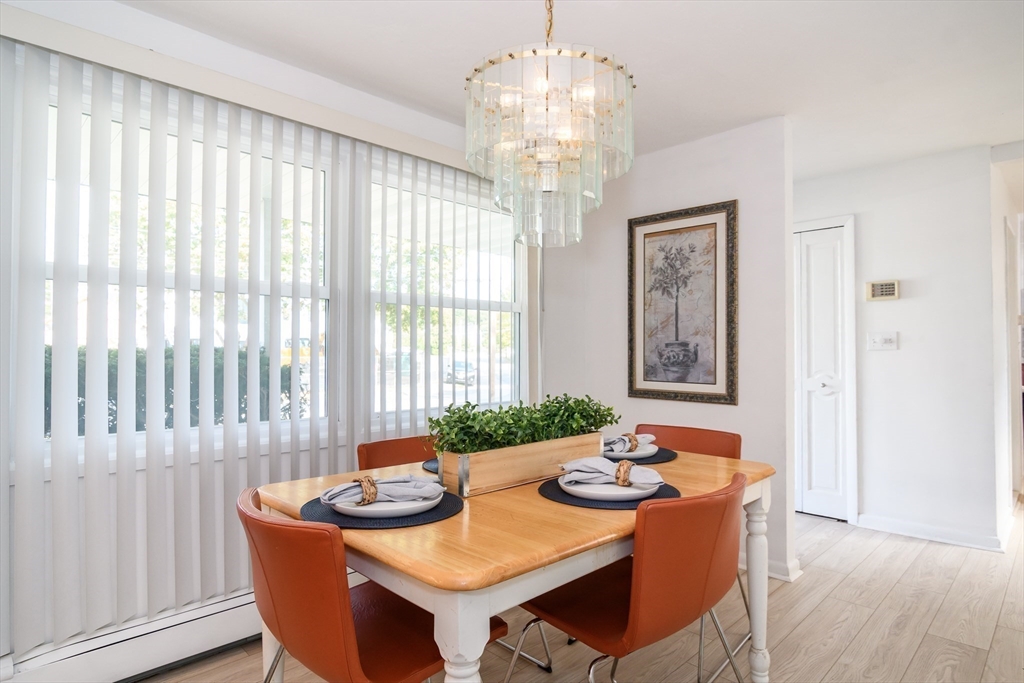 9 Liberty Street Natick, MA 01760 - Photo 5 of 27 a view of a dining room with furniture window and outside view