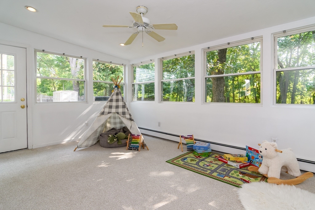 9 Liberty Street Natick, MA 01760 - Photo 9 of 27 a room with gym equipment and a window