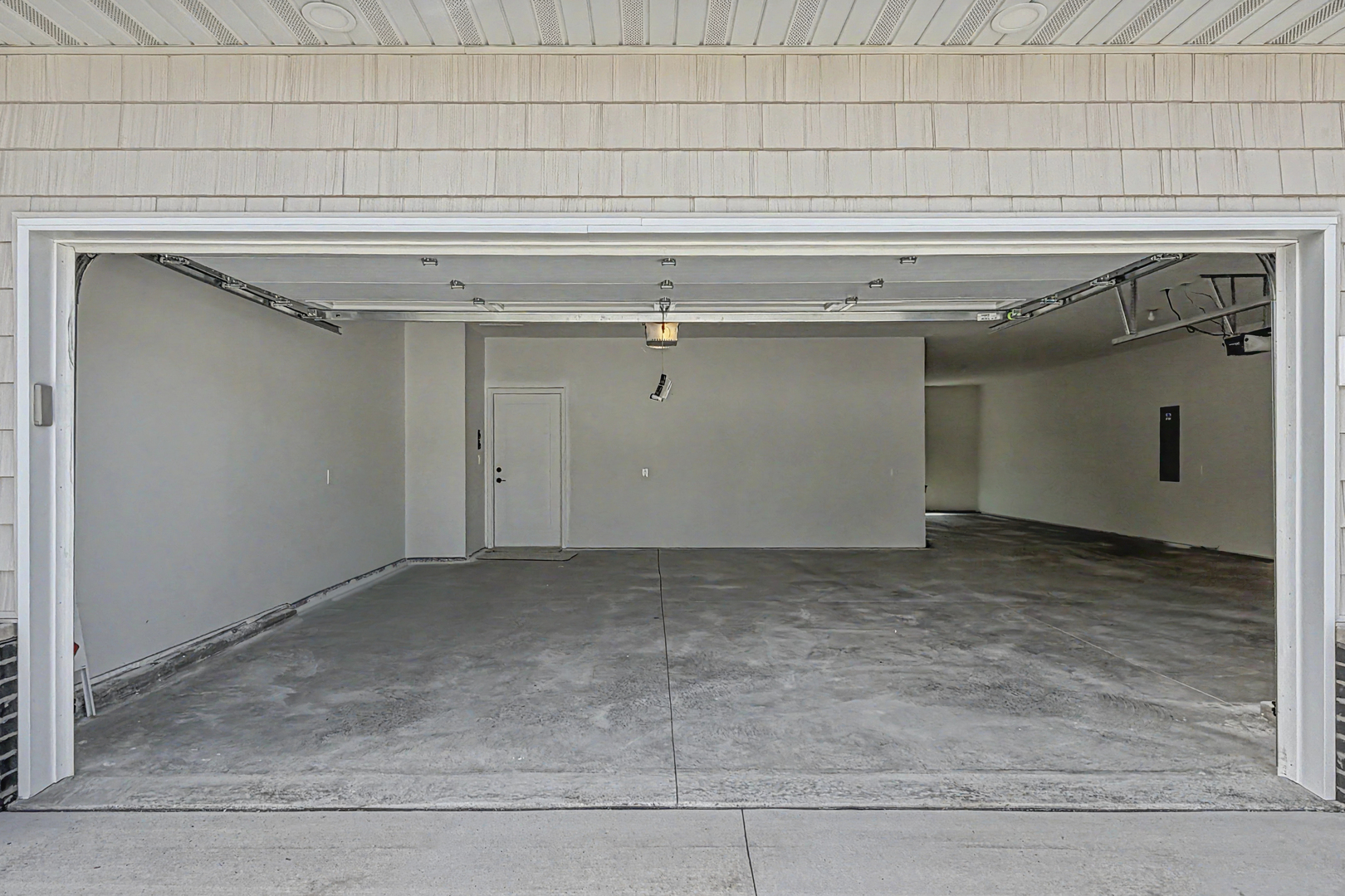 606 Kevin Road Blue Grass, IA 52726 - Photo 8 of 33 a view of a garage