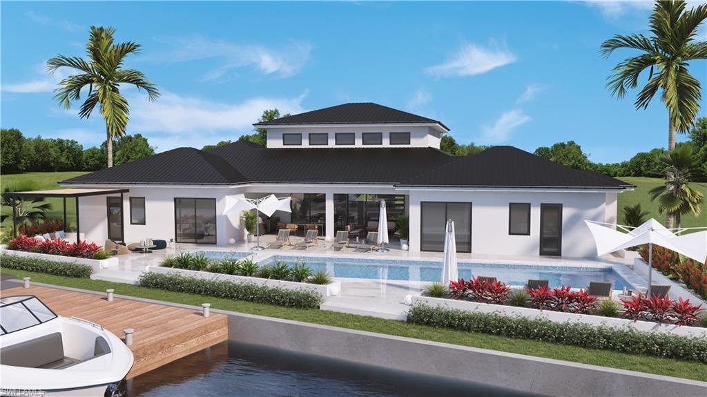 a front view of a house with a yard and potted plants