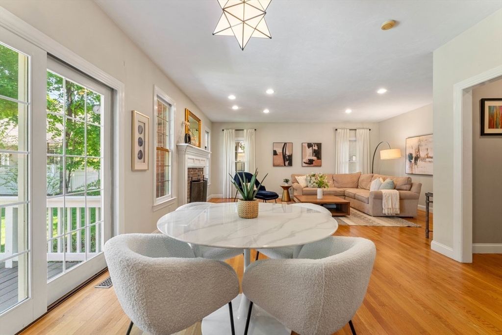 33 Bond Street Needham, MA 02492 - Photo 13 of 35 a living room with furniture dining table and a large window