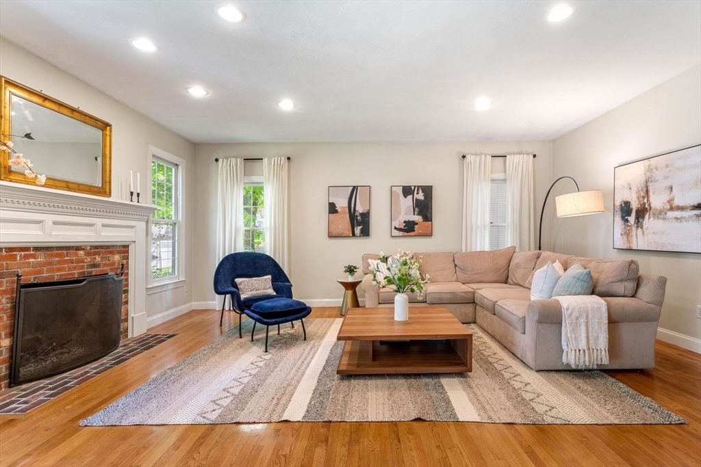 33 Bond Street Needham, MA 02492 - Photo 14 of 35 a living room with furniture and a fireplace