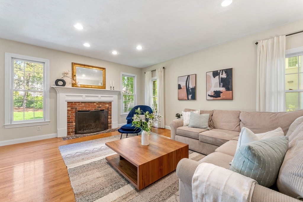 33 Bond Street Needham, MA 02492 - Photo 15 of 35 a living room with furniture and a fireplace