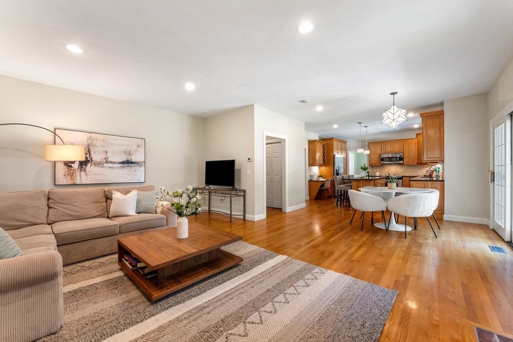 33 Bond Street Needham, MA 02492 - Photo 16 of 35 a living room with furniture and a table