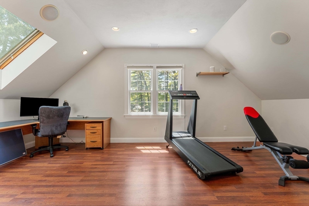 33 Bond Street Needham, MA 02492 - Photo 25 of 35 a room with furniture and a wooden floor