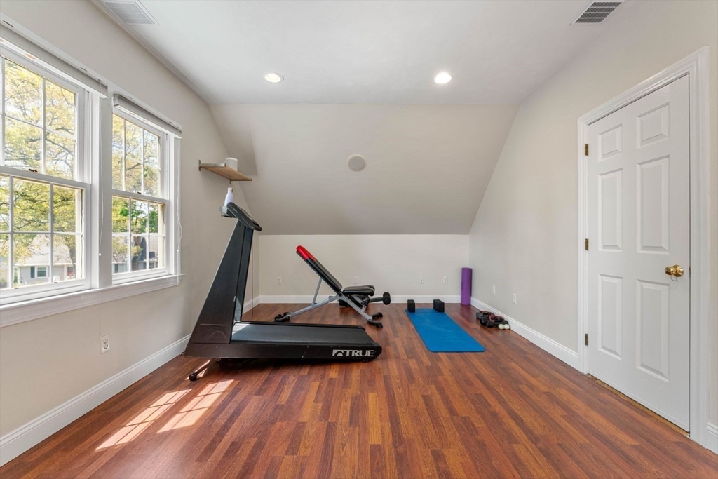 33 Bond Street Needham, MA 02492 - Photo 26 of 35 a view of a room with wooden floor and windows